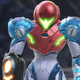Samus stands, head slightly bowed, her visor glowing a bright green.